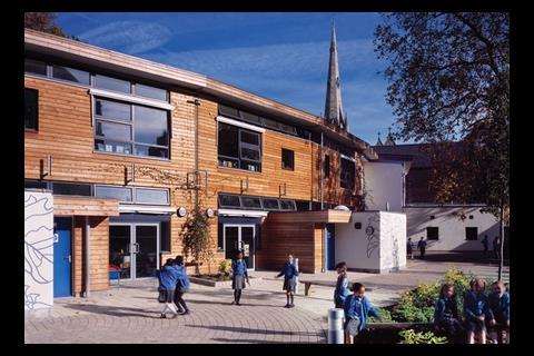 Studio E’s Sacred Heart primary school in Hammersmith, west London, was built in 2007 around two 120-year-old plane trees